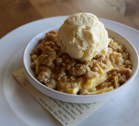 Seasonal Fruit Crisp with House Made Ice Cream.